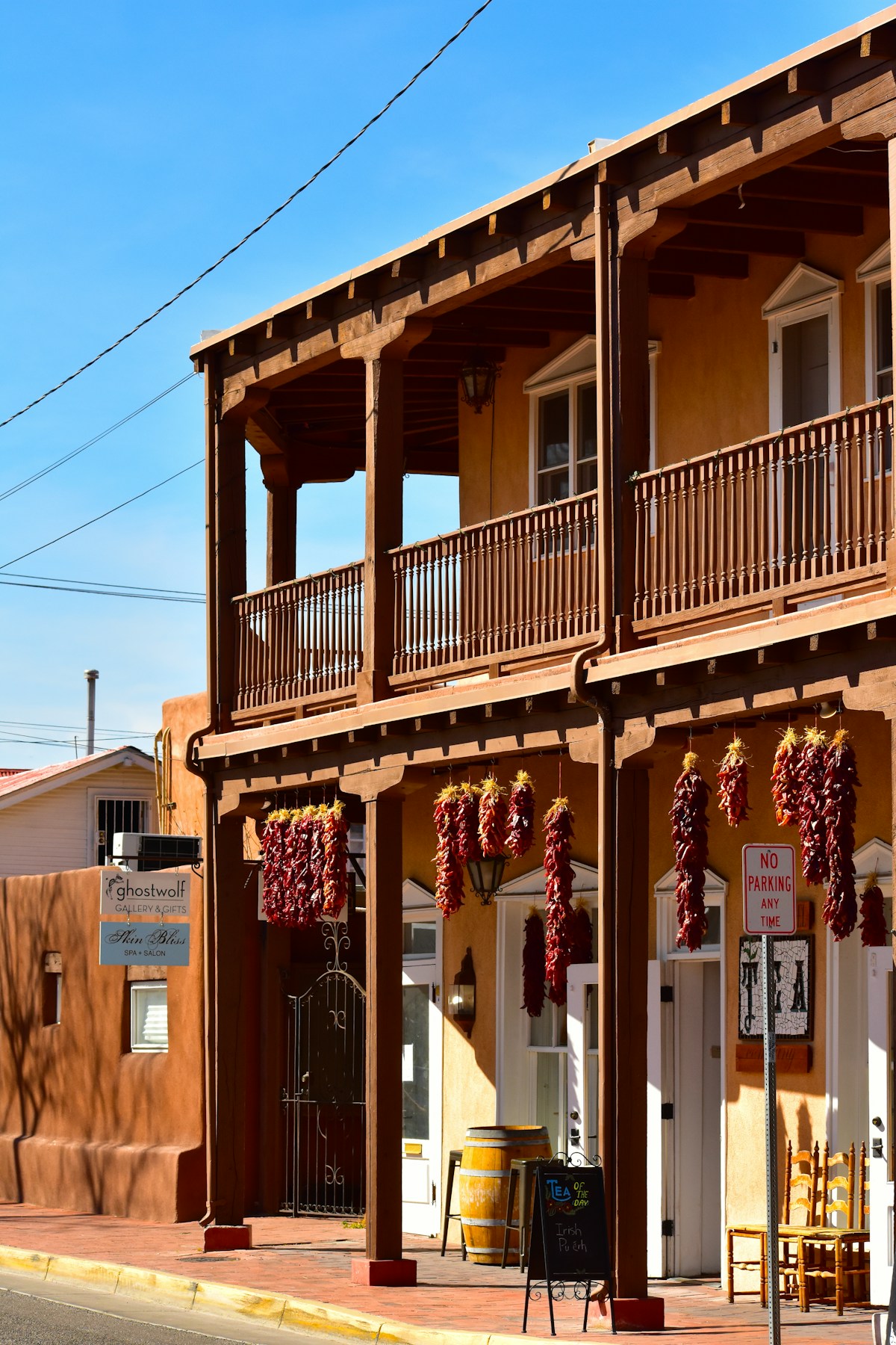 Colorful building with strings of red peppers hanging from balconies, Albuquerque, New Mexico