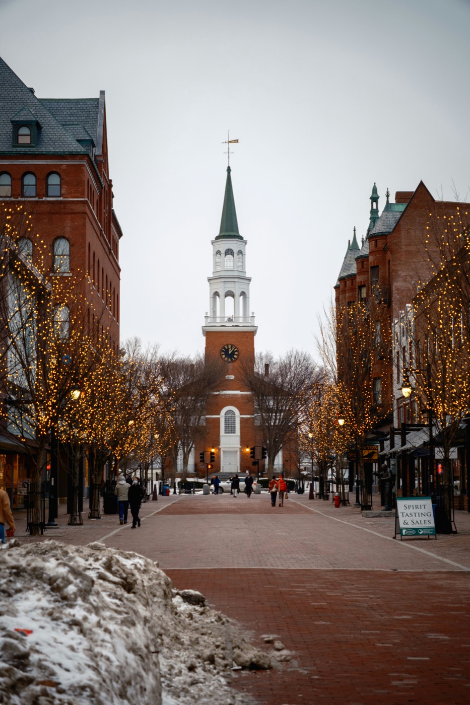 Church Street Marketplace with clock tower and Christmas lights in winter, Burlington Vermont