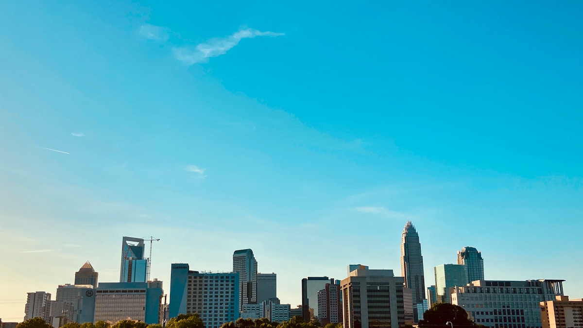 Charlotte city skyline under blue sky, North Carolina