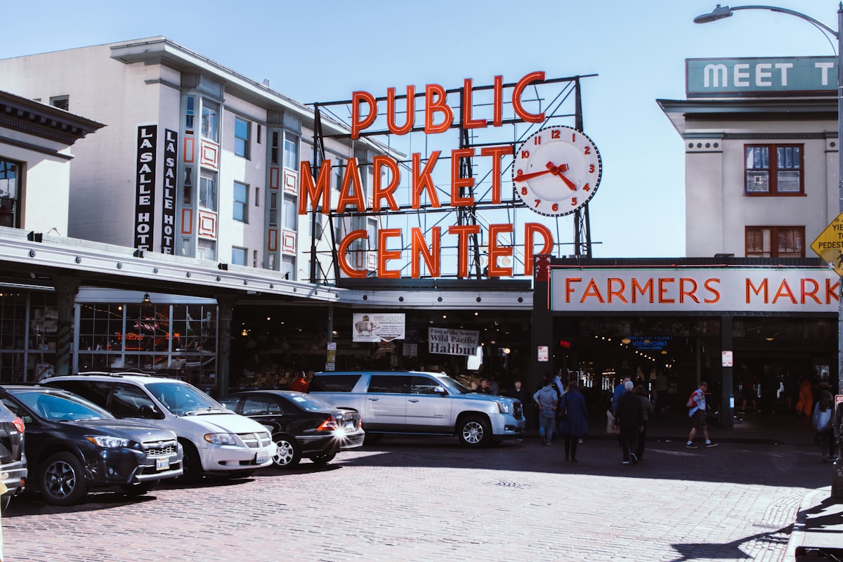 Visitors outside Pike Place Market in Seattle — best food cities in the USA