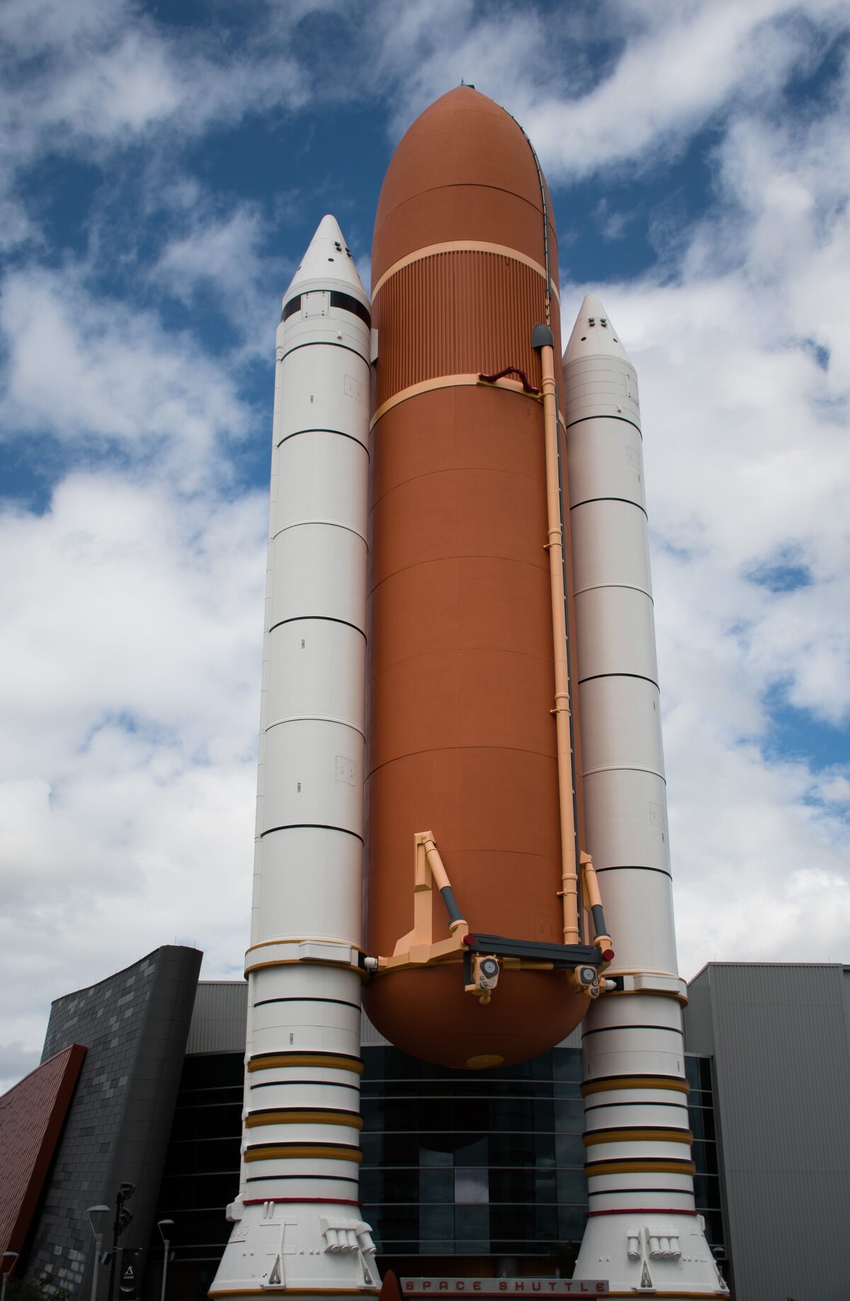 Space shuttle stack with external tank and solid rocket boosters on display at the Kennedy Space Center Visitor Complex, Florida