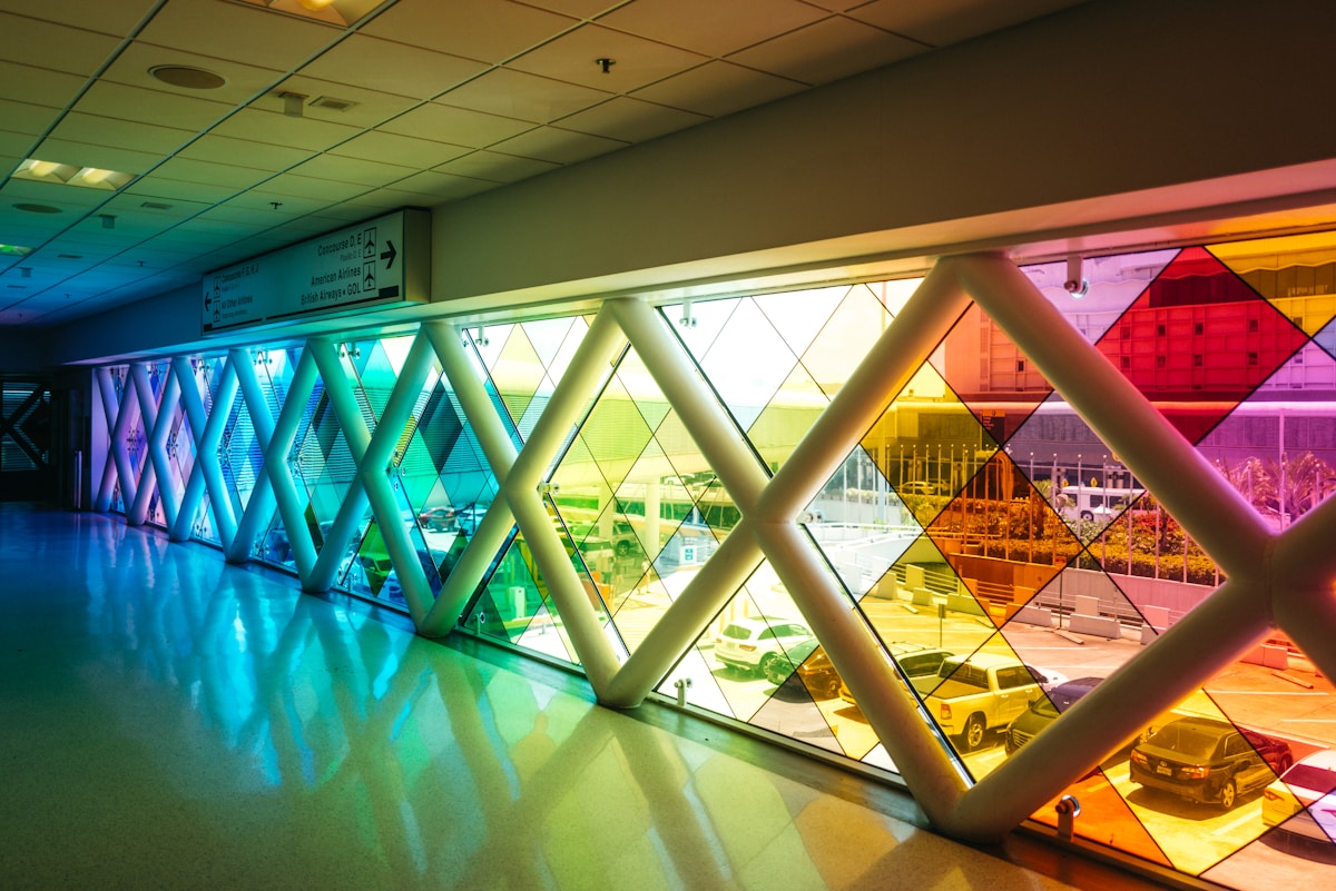 Colorful stained-glass corridor at Miami International Airport terminal, Florida