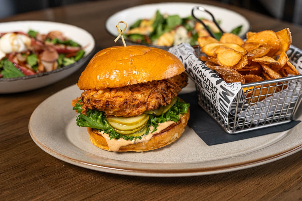 Nashville hot chicken sandwich with chips — food guide to Nashville, Tennessee