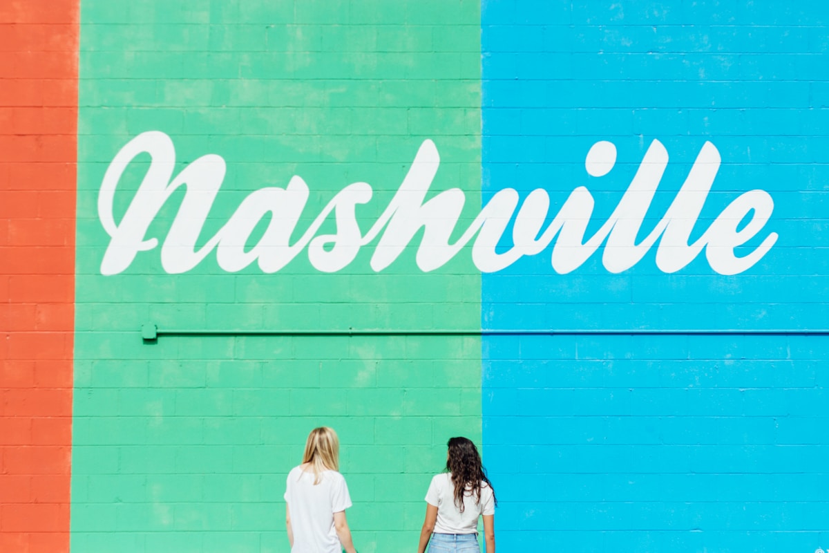 Nashville's Lower Broadway lit up at night with neon honky-tonk signs