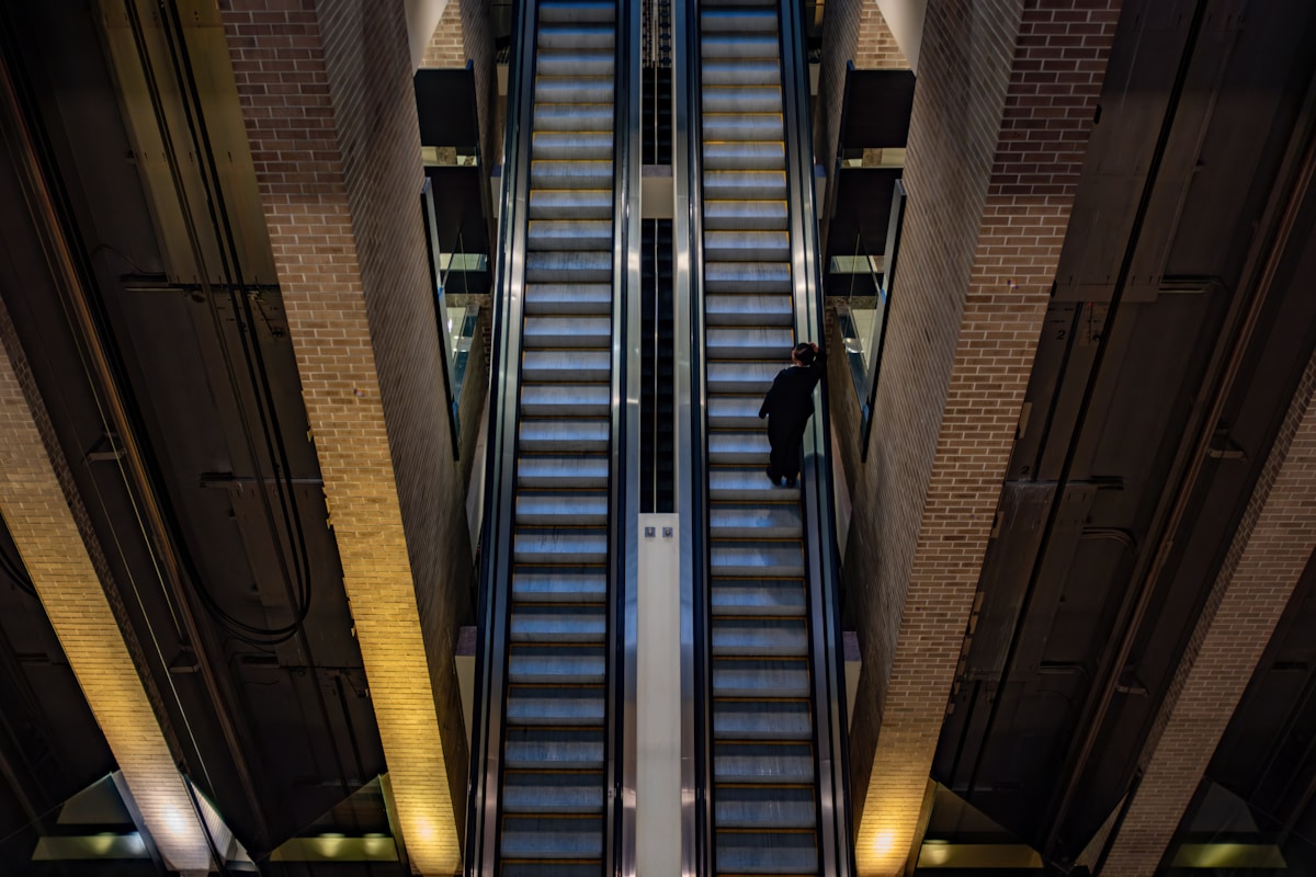 Illuminated escalator at Louis Armstrong New Orleans International Airport, Louisiana