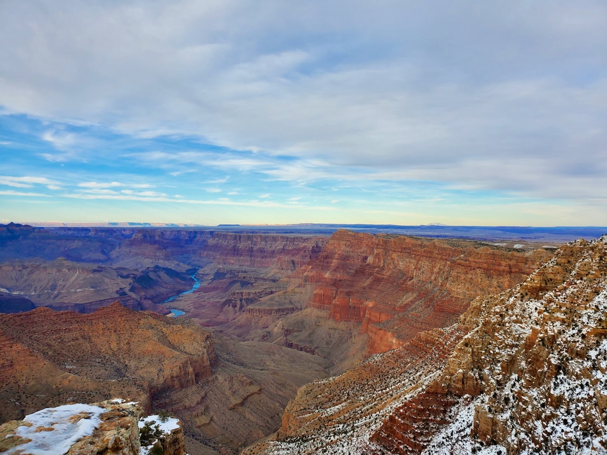 Layered red rock formations of the Grand Canyon seen from the South Rim at golden hour