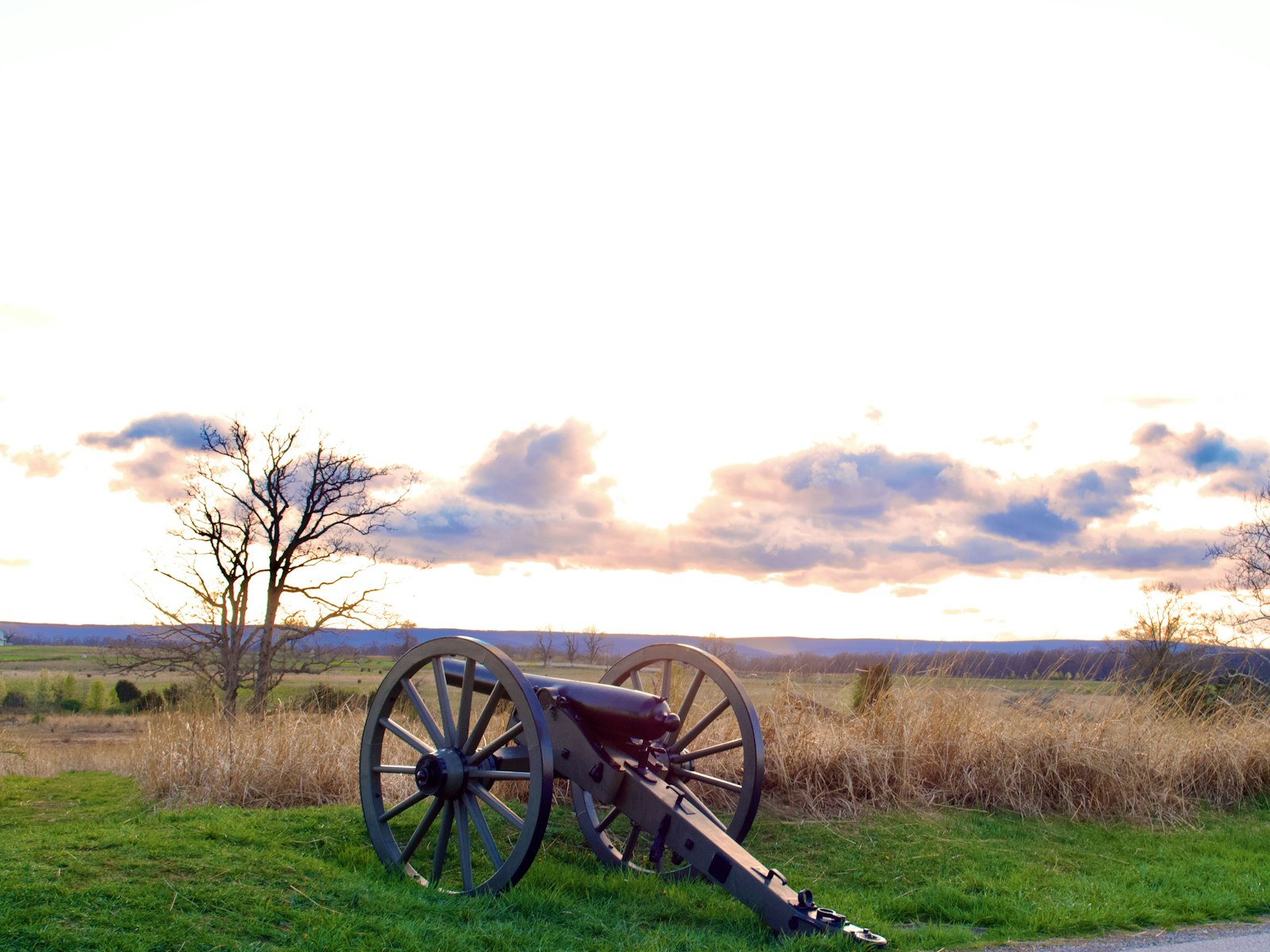 Civil War cannon on the grassy battlefield at Gettysburg National Military Park, Pennsylvania