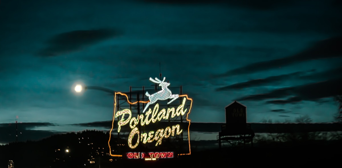Portland Oregon neon sign lit up at night, Oregon
