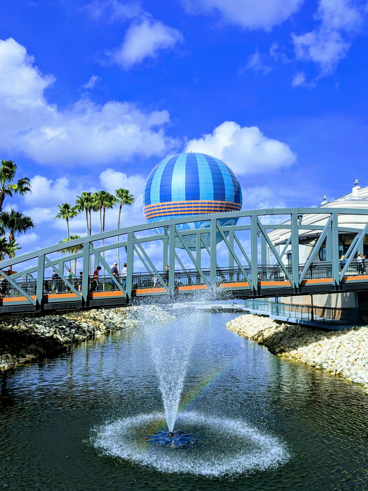 Disney Springs walking bridge with the characteristic balloon and fountain, Walt Disney World, Orlando, Florida