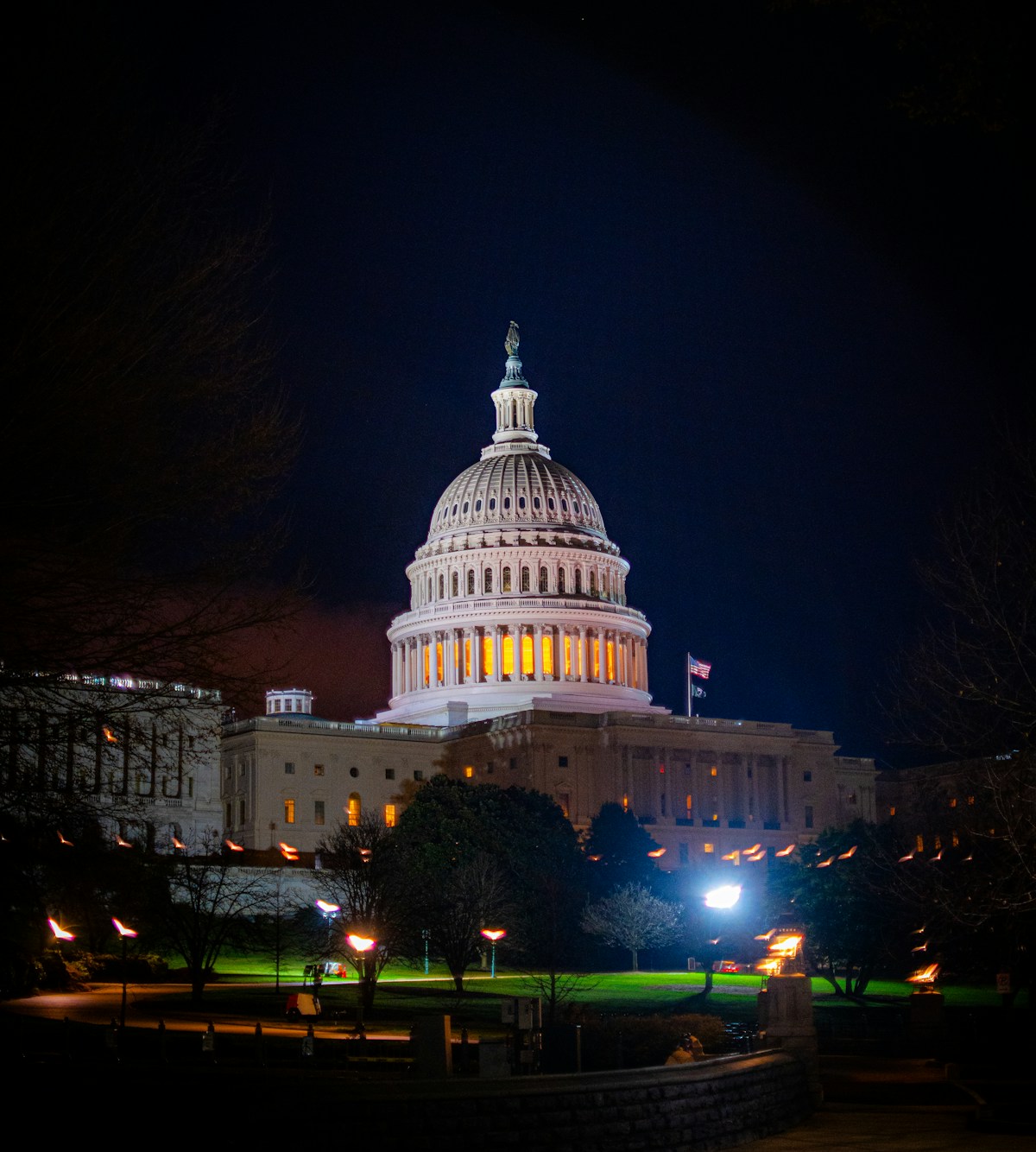 US Capitol building illuminated at night, Washington DC