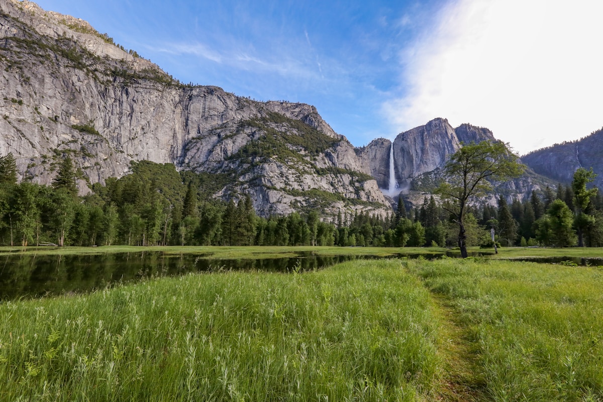 Yosemite Valley with Half Dome rising above the Merced River in morning mist