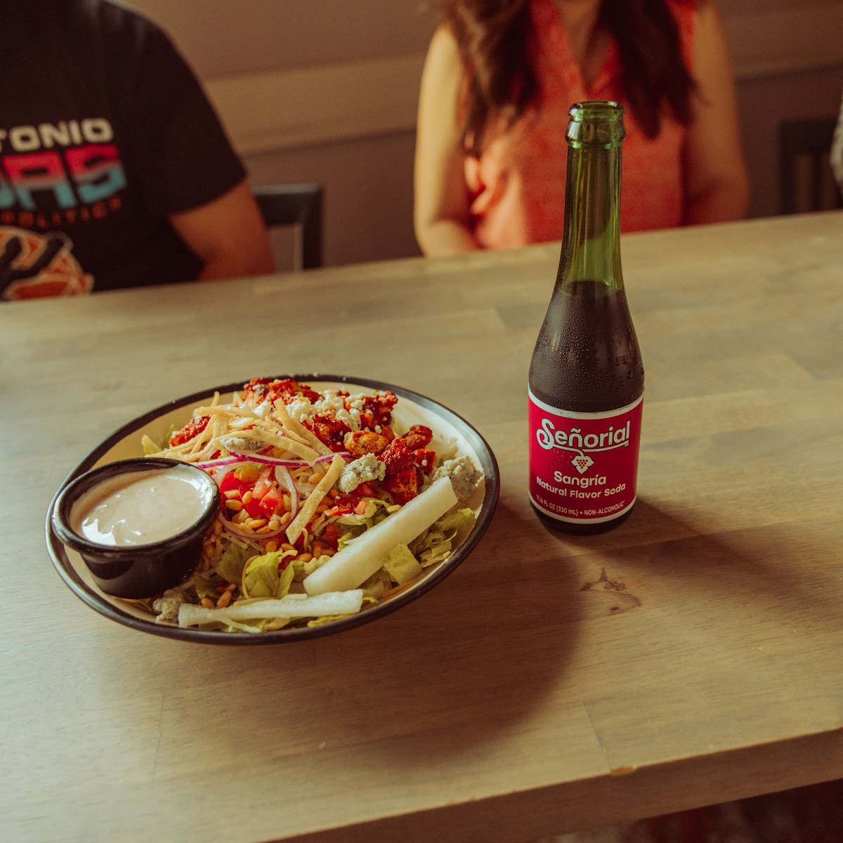 A plate of New Mexican food and a cold beer at a Santa Fe restaurant