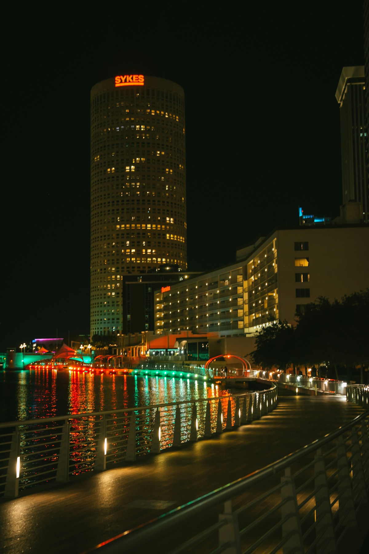 The Tampa, Florida skyline at night with lights reflecting on the water