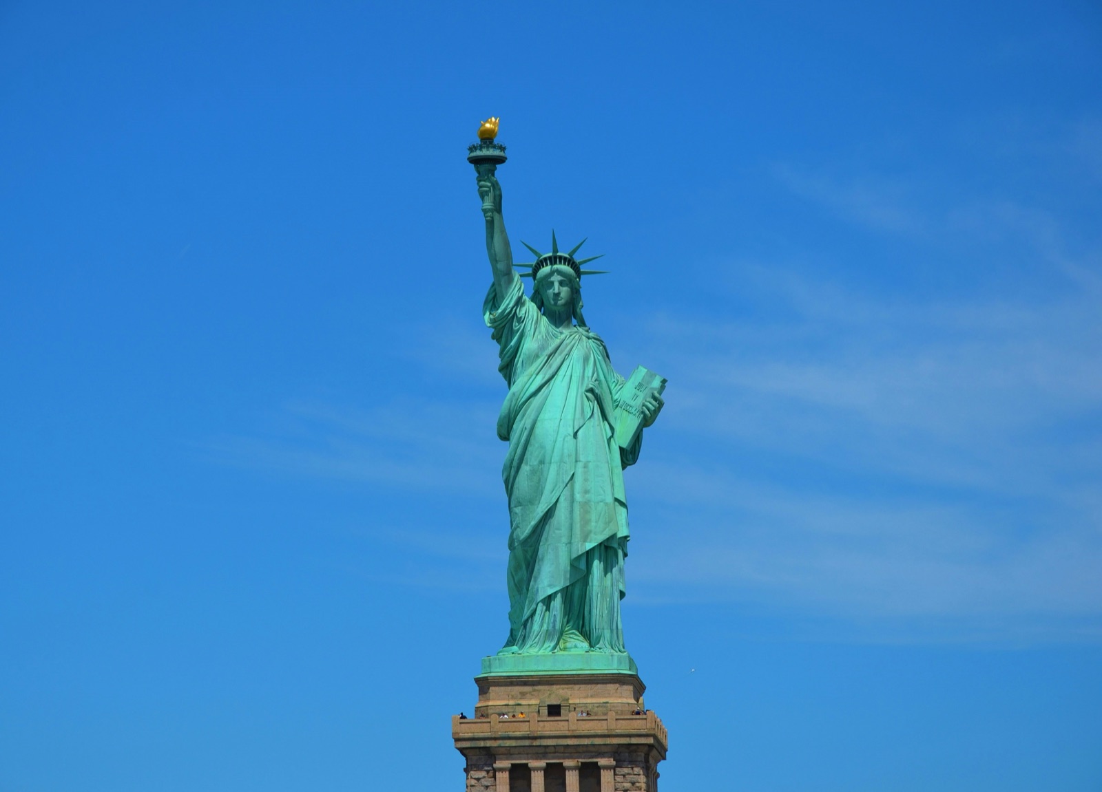 Statue of Liberty standing in New York Harbor, USA