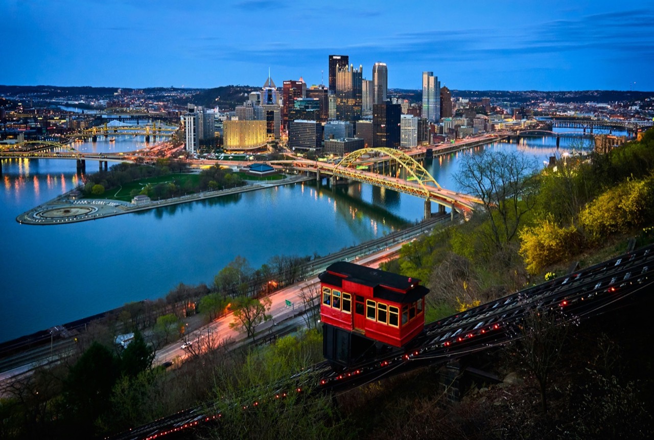 Aerial view of Pittsburgh bridges and buildings under blue sky, Pennsylvania