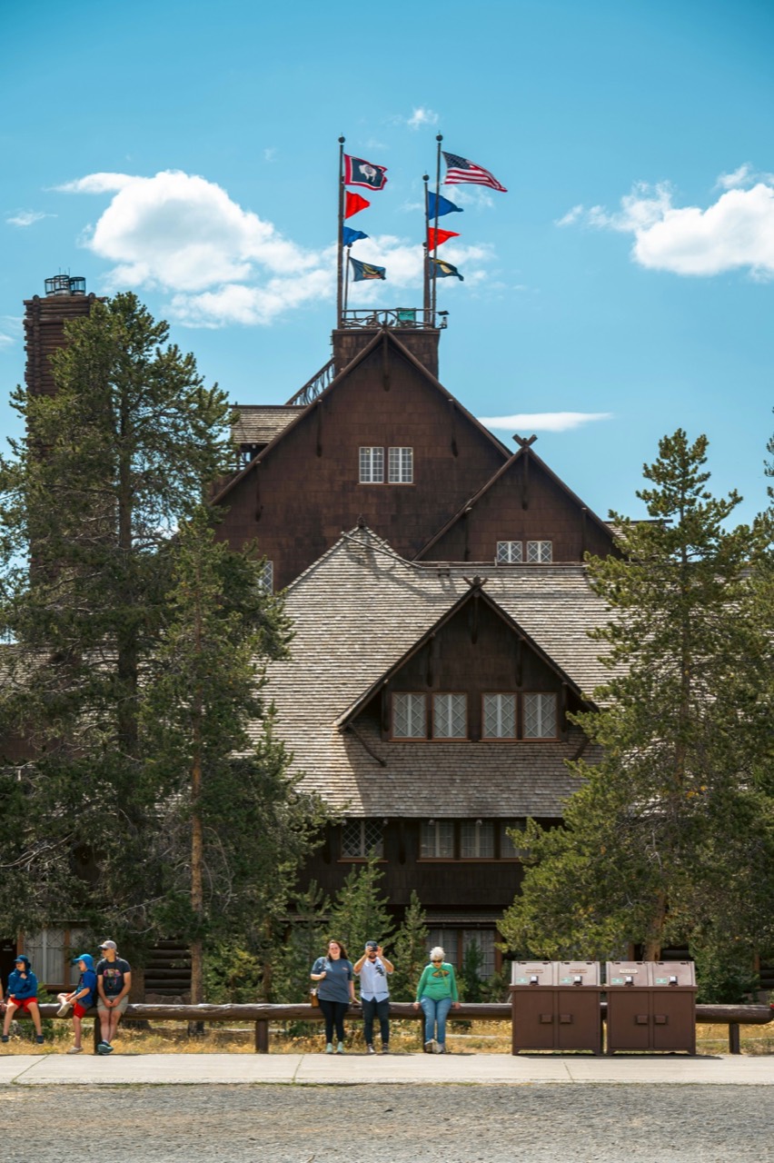 Historic wooden lodge with flags at Yellowstone National Park, Wyoming
